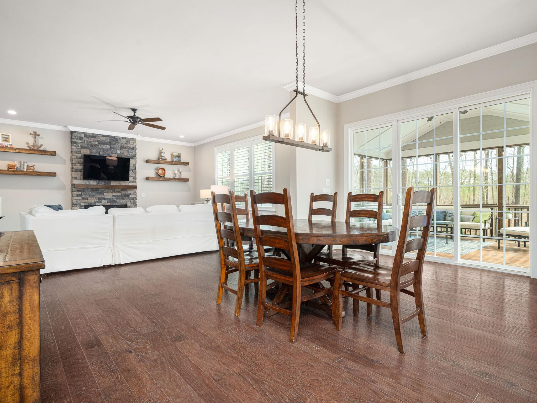 7532 Hasentree Way Wake Forest, NC 27587 - Photo 15 of 40 a view of a dining room with furniture window and wooden floor