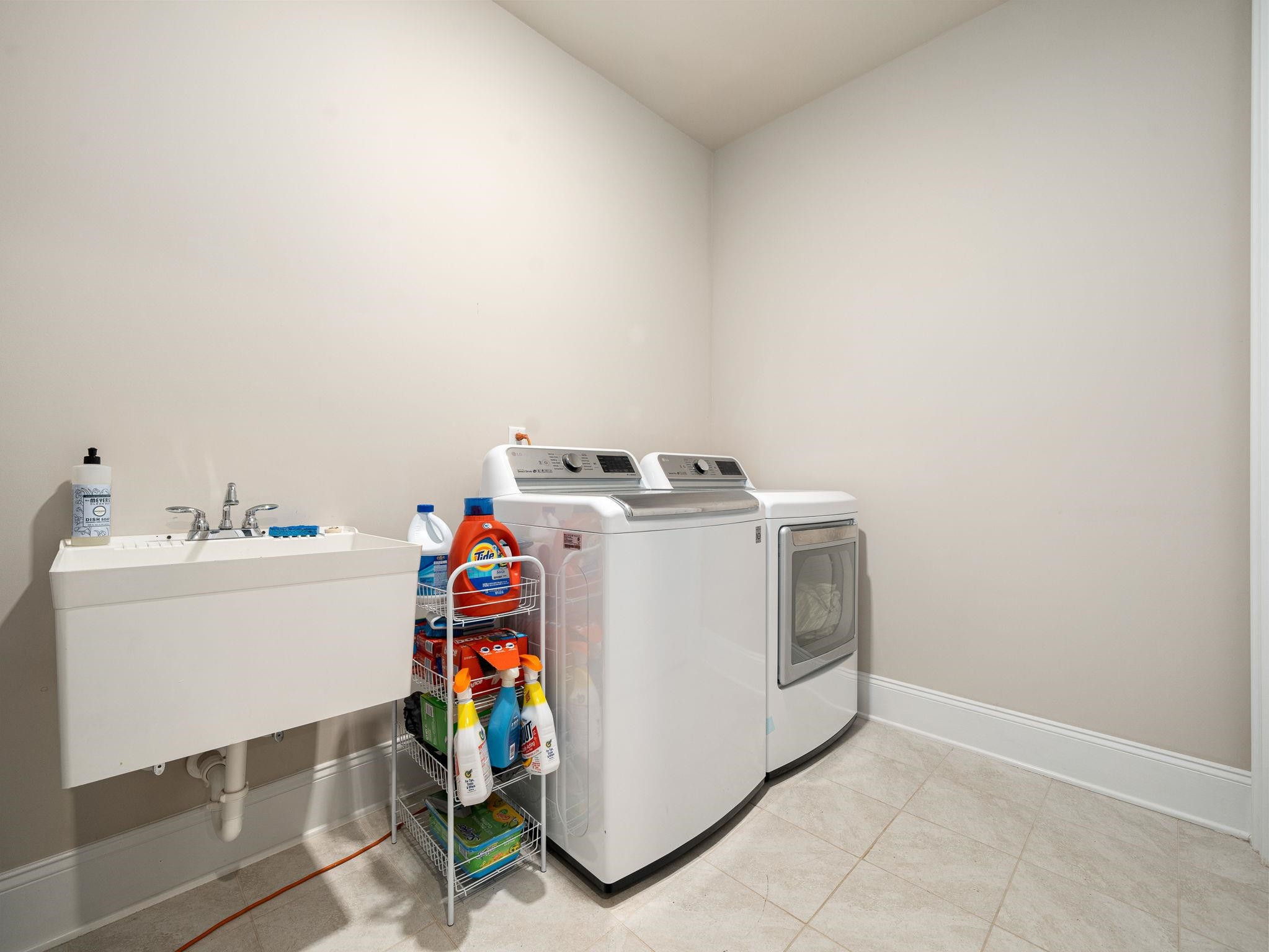7532 Hasentree Way Wake Forest, NC 27587 - Photo 20 of 40 a utility room with dryer and washer