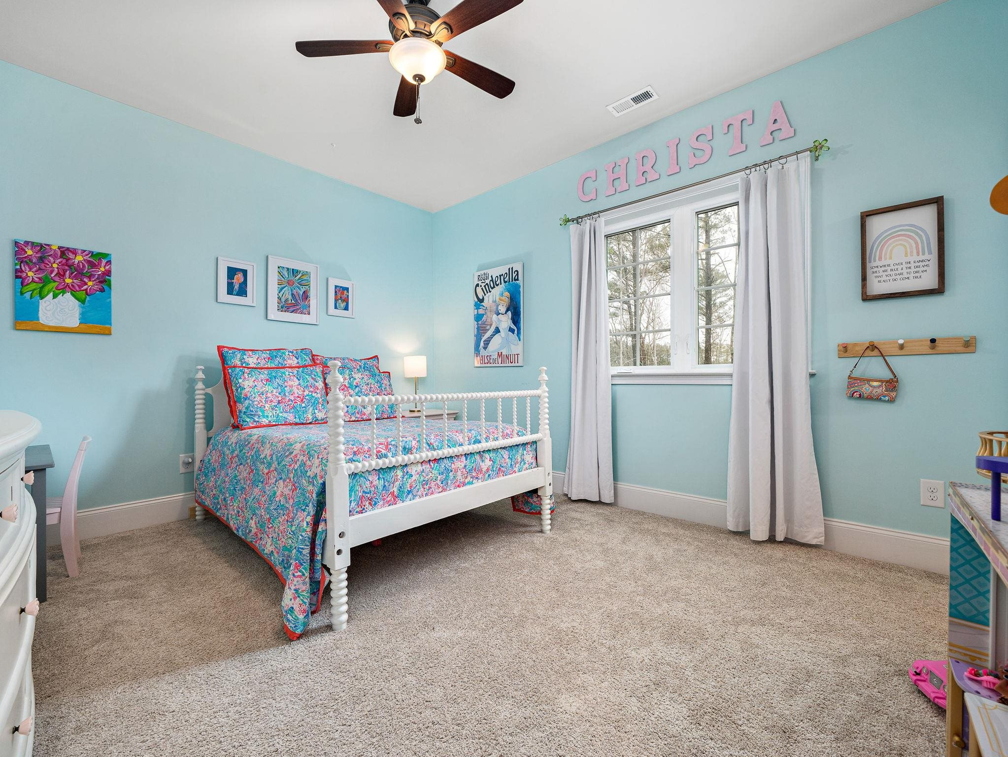 7532 Hasentree Way Wake Forest, NC 27587 - Photo 31 of 40 a bedroom with a bed and a window