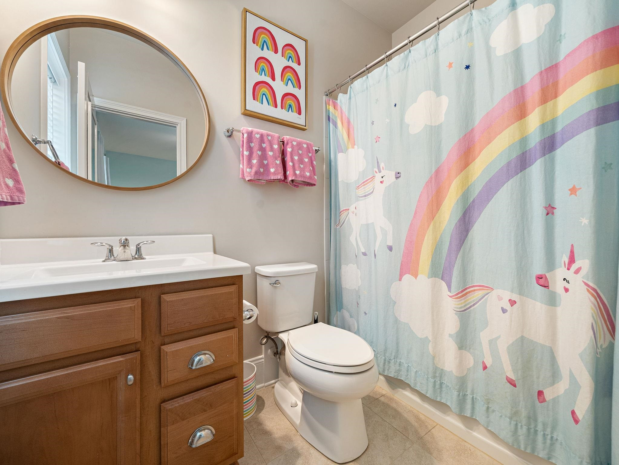 7532 Hasentree Way Wake Forest, NC 27587 - Photo 32 of 40 a white toilet sitting next to a bathroom sink