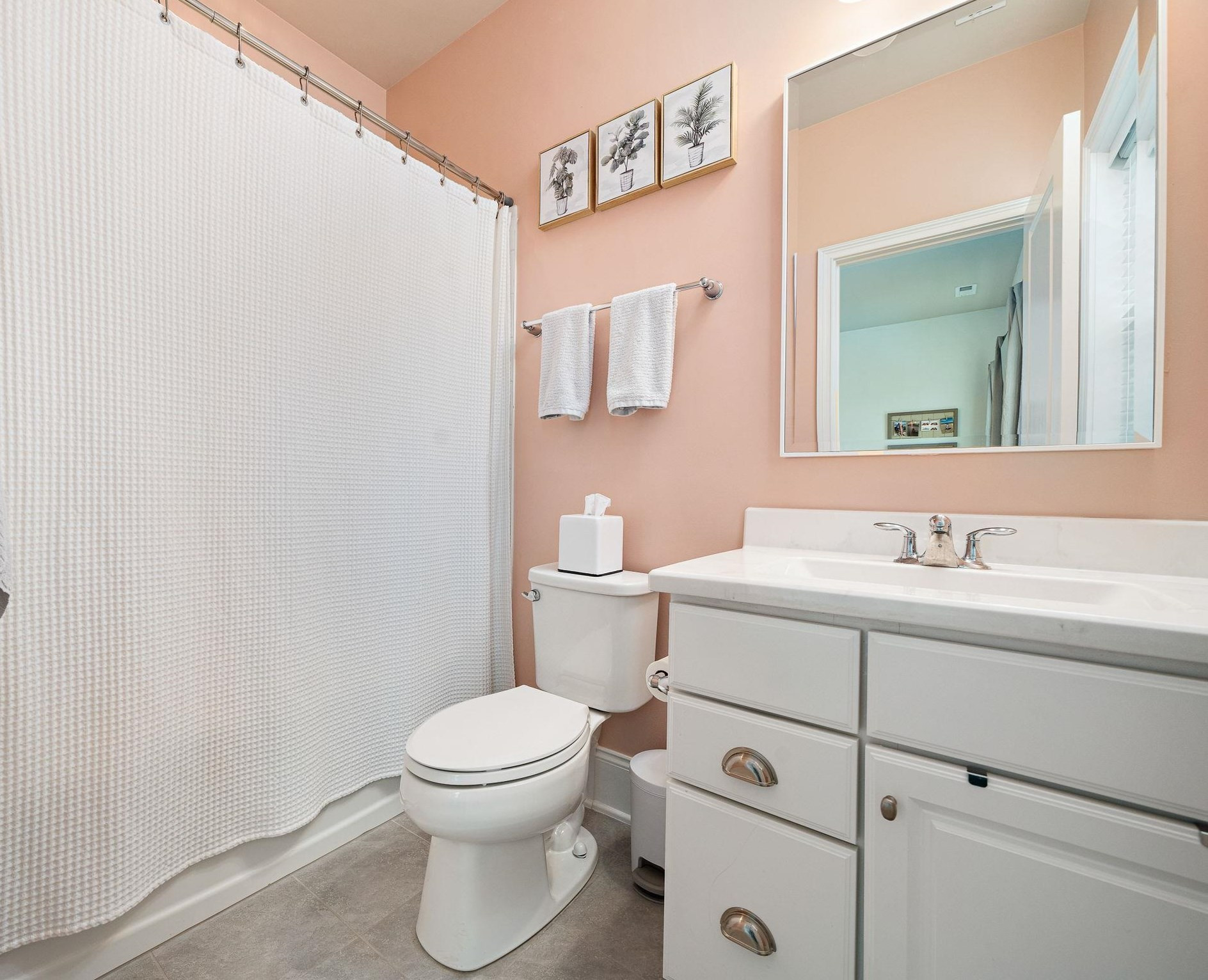 7532 Hasentree Way Wake Forest, NC 27587 - Photo 34 of 40 a bathroom with a toilet sink vanity and mirror