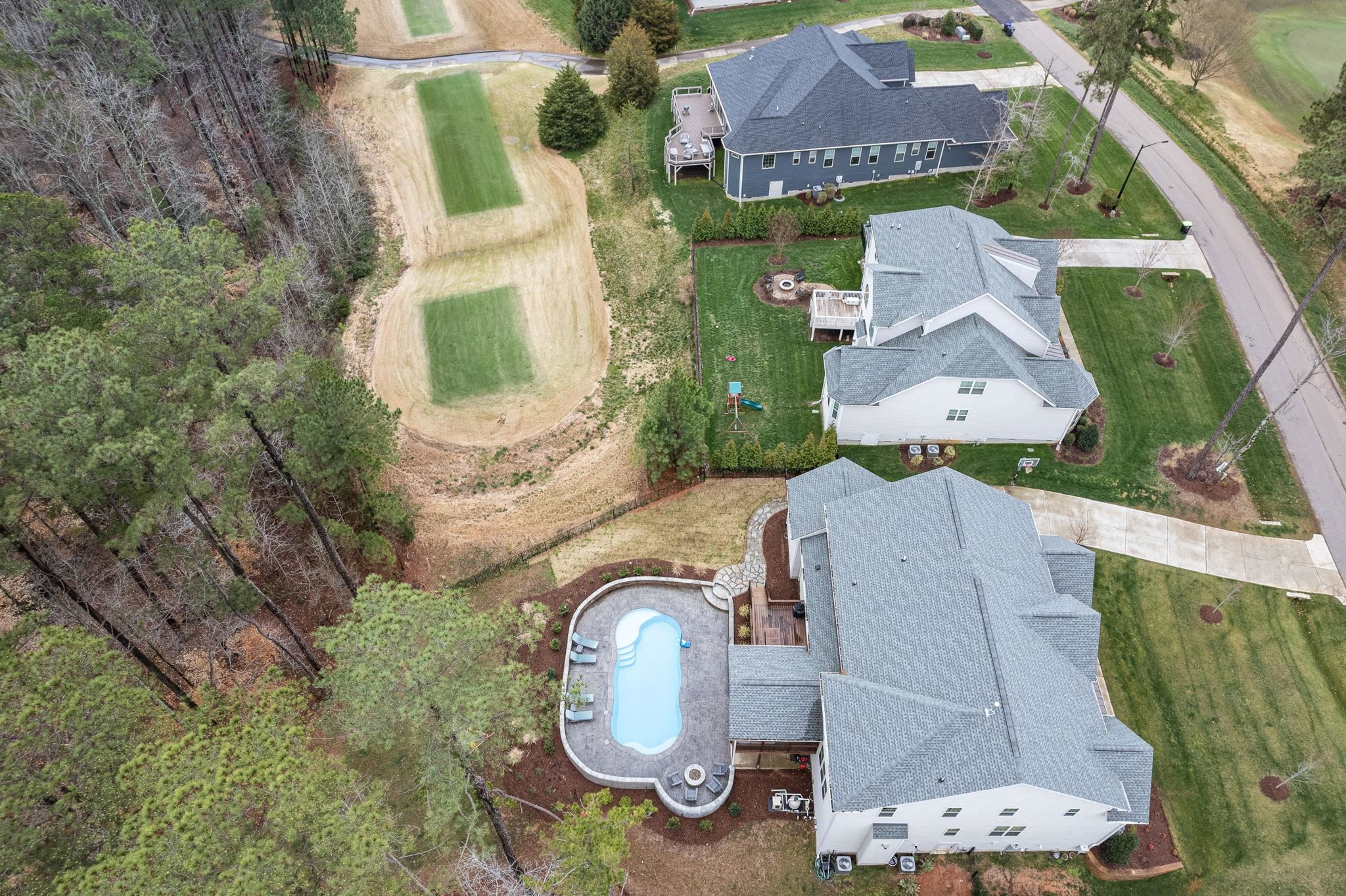 7532 Hasentree Way Wake Forest, NC 27587 - Photo 38 of 40 an aerial view of a house with garden space and a street view