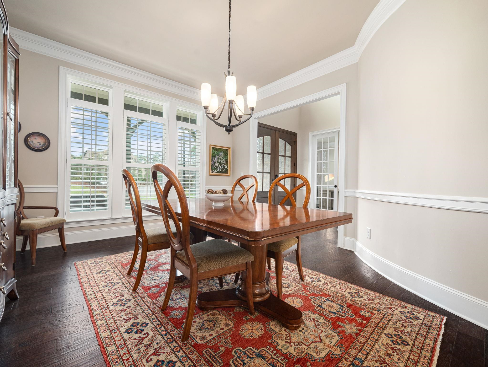 7532 Hasentree Way Wake Forest, NC 27587 - Photo 5 of 40 a view of a dining room with furniture window and wooden floor
