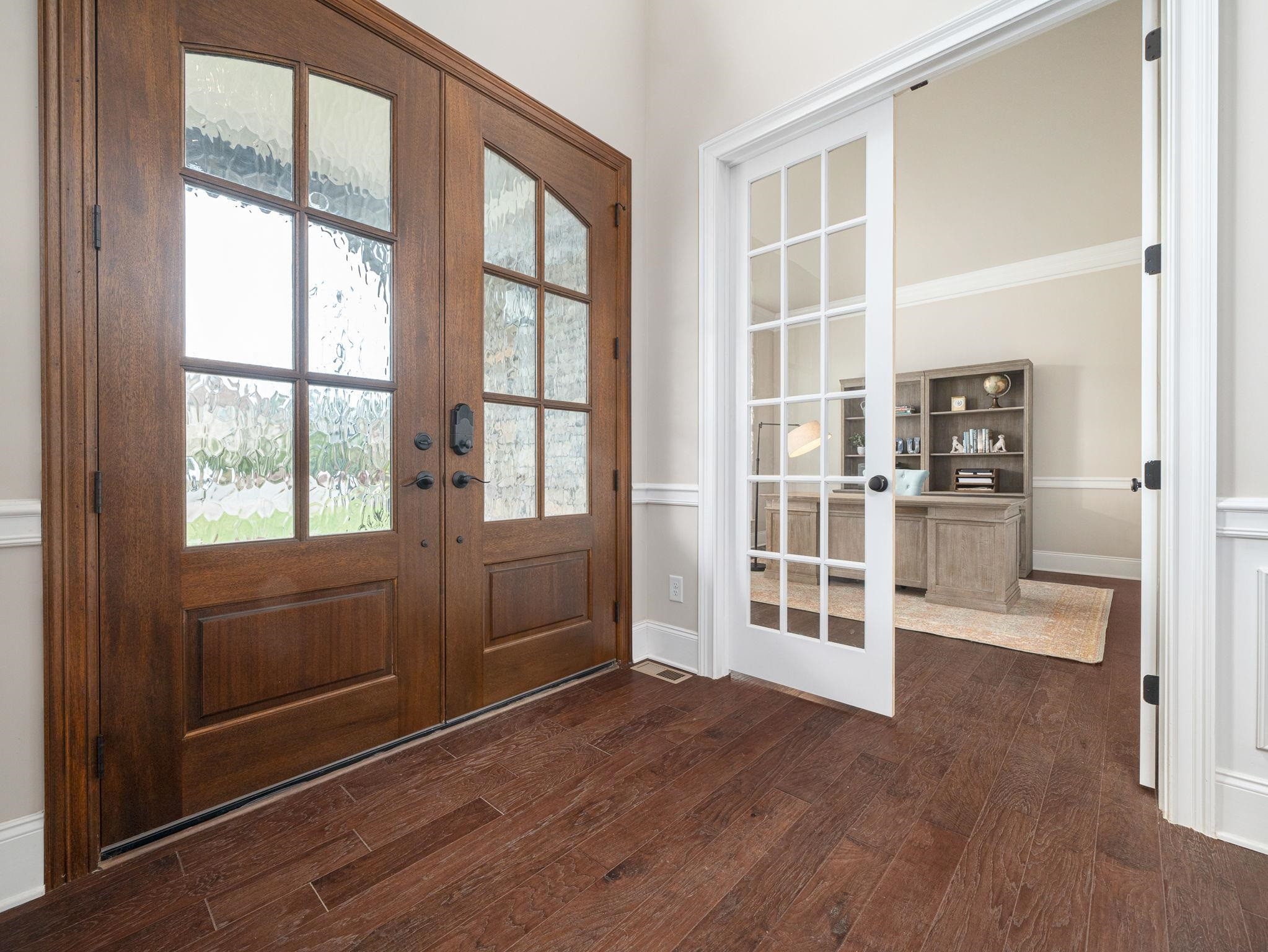 7532 Hasentree Way Wake Forest, NC 27587 - Photo 6 of 40 an empty room with wooden floor and windows
