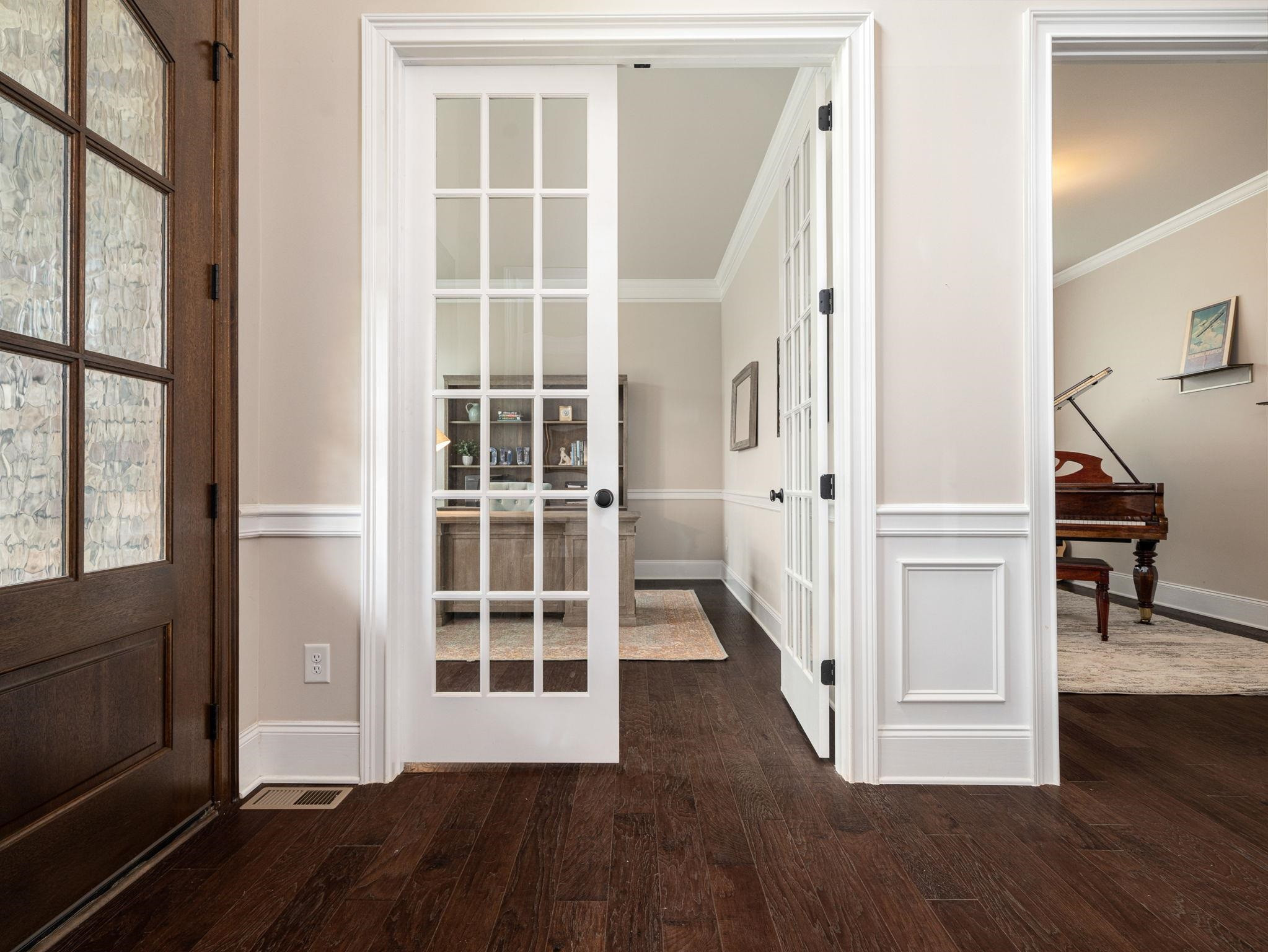 7532 Hasentree Way Wake Forest, NC 27587 - Photo 8 of 40 a view of staircase with wooden floor and windows