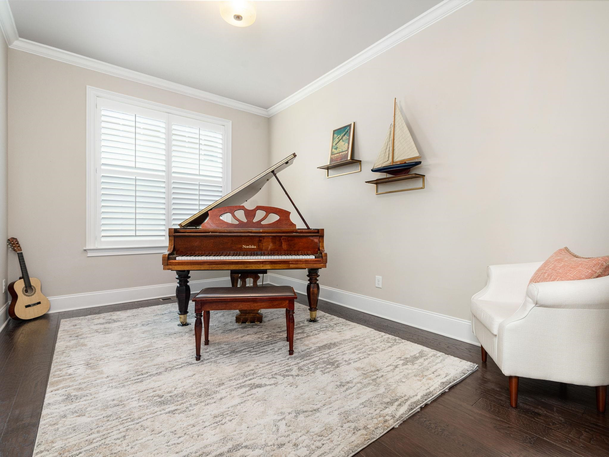 7532 Hasentree Way Wake Forest, NC 27587 - Photo 9 of 40 a view of a workspace with furniture and a window
