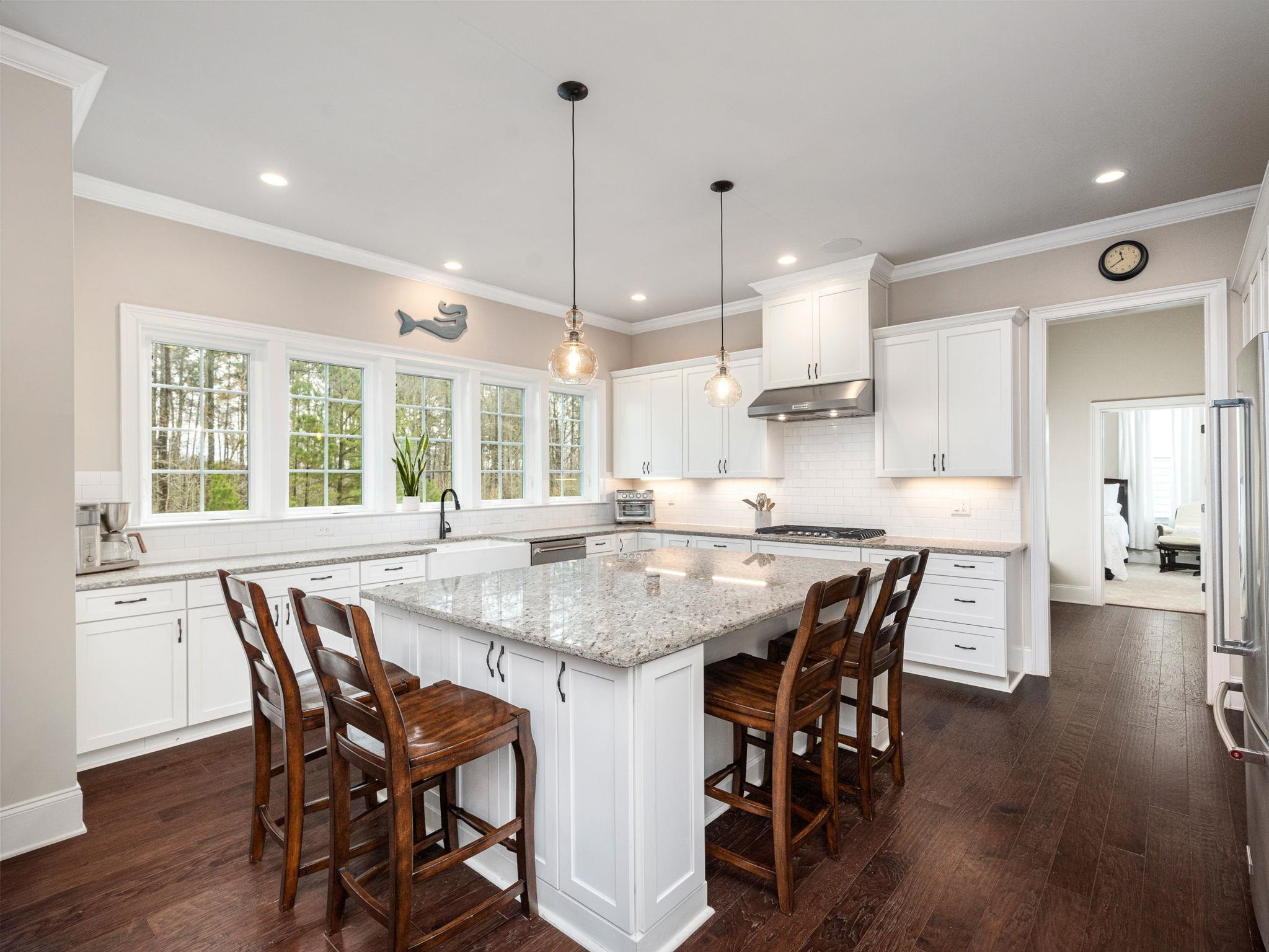 7532 Hasentree Way Wake Forest, NC 27587 - Photo 10 of 40 a dining table with chairs and wooden floor
