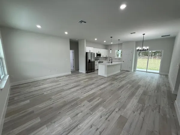 a view of kitchen and windows