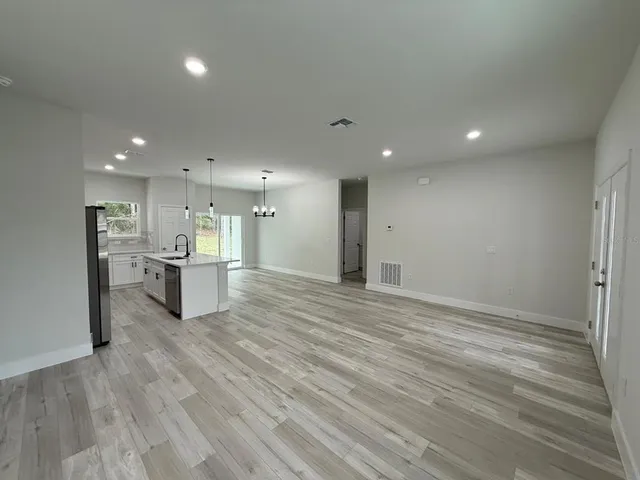 a view of kitchen dining table and kitchen view