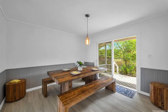 a reading room with furniture and a window