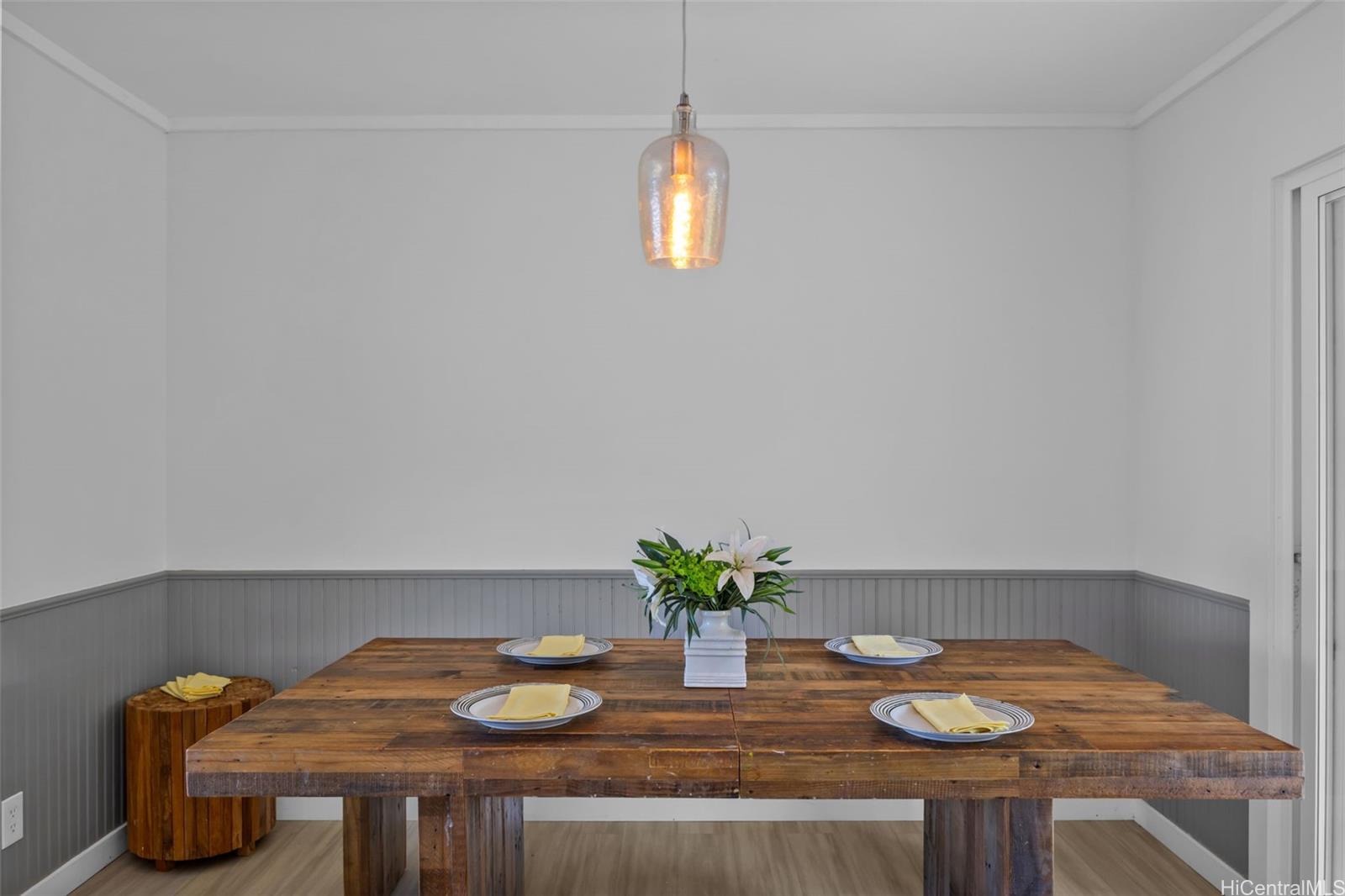2576 Alohia Place Haiku, HI 96708 - Photo 12 of 25 a table with a vase and flowers on it