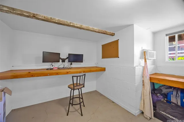 a room with furniture and a flat screen tv