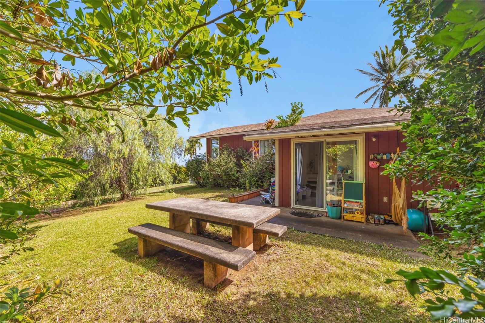 2576 Alohia Place Haiku, HI 96708 - Photo 24 of 25 a view of a house with swimming pool and sitting area