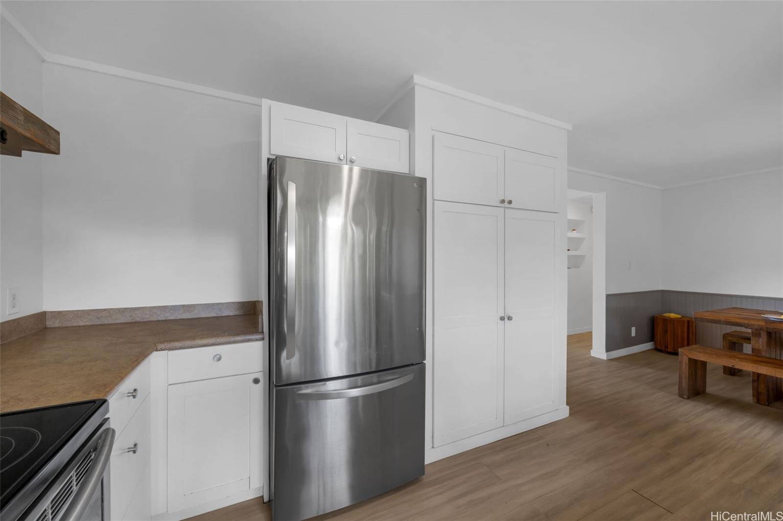 2576 Alohia Place Haiku, HI 96708 - Photo 8 of 25 a metallic refrigerator freezer sitting in a kitchen