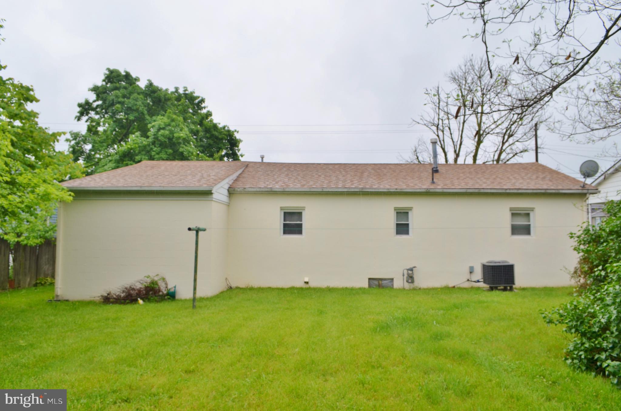 293 Valley Mill Road Winchester, VA 22602 - Photo 27 of 29 a front view of house with yard and trees in the background