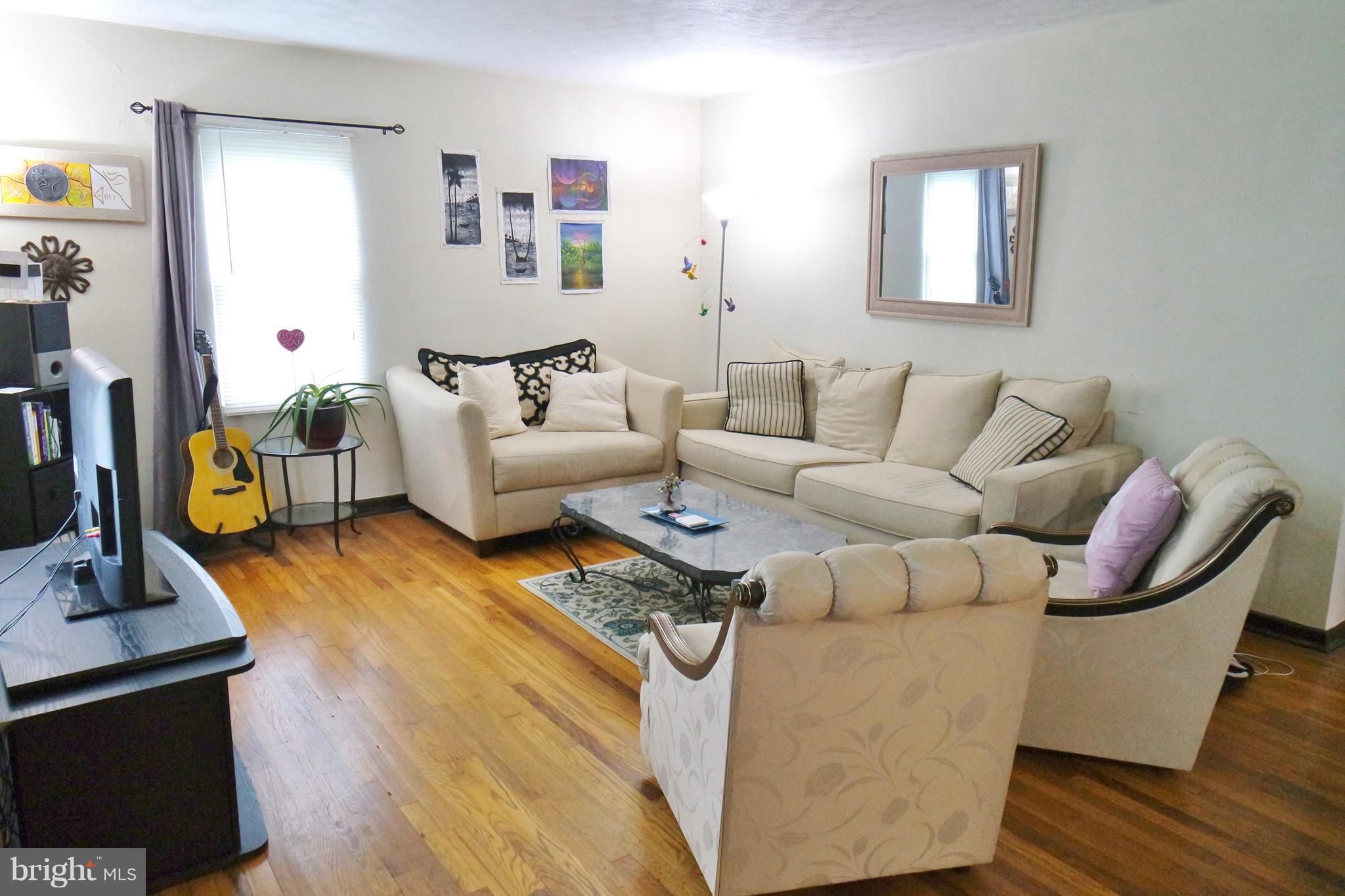 293 Valley Mill Road Winchester, VA 22602 - Photo 5 of 29 a living room with furniture and a flat screen tv