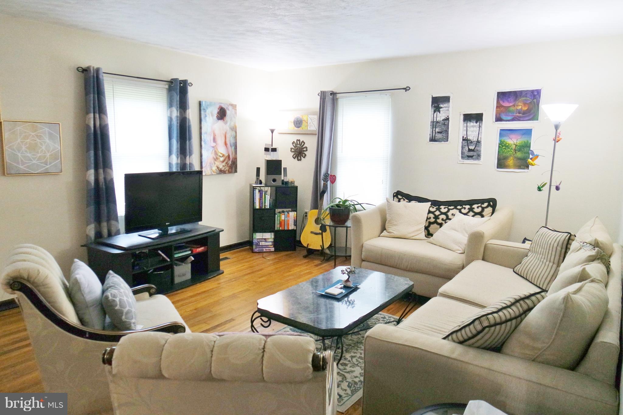 293 Valley Mill Road Winchester, VA 22602 - Photo 6 of 29 a living room with furniture and a flat screen tv