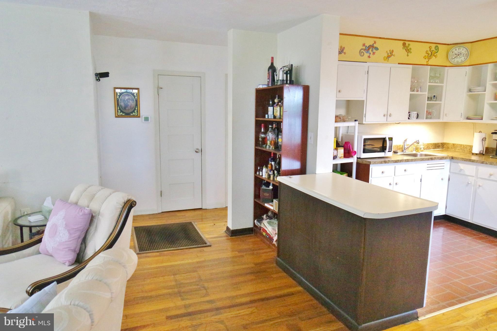 293 Valley Mill Road Winchester, VA 22602 - Photo 10 of 29 a kitchen with stainless steel appliances cabinets and wooden floor