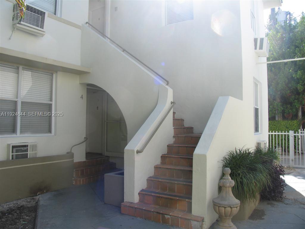 1030 Jefferson Avenue, Unit 11 Miami Beach, FL 33139 - Photo 2 of 3 a view of entryway and hall with wooden floor