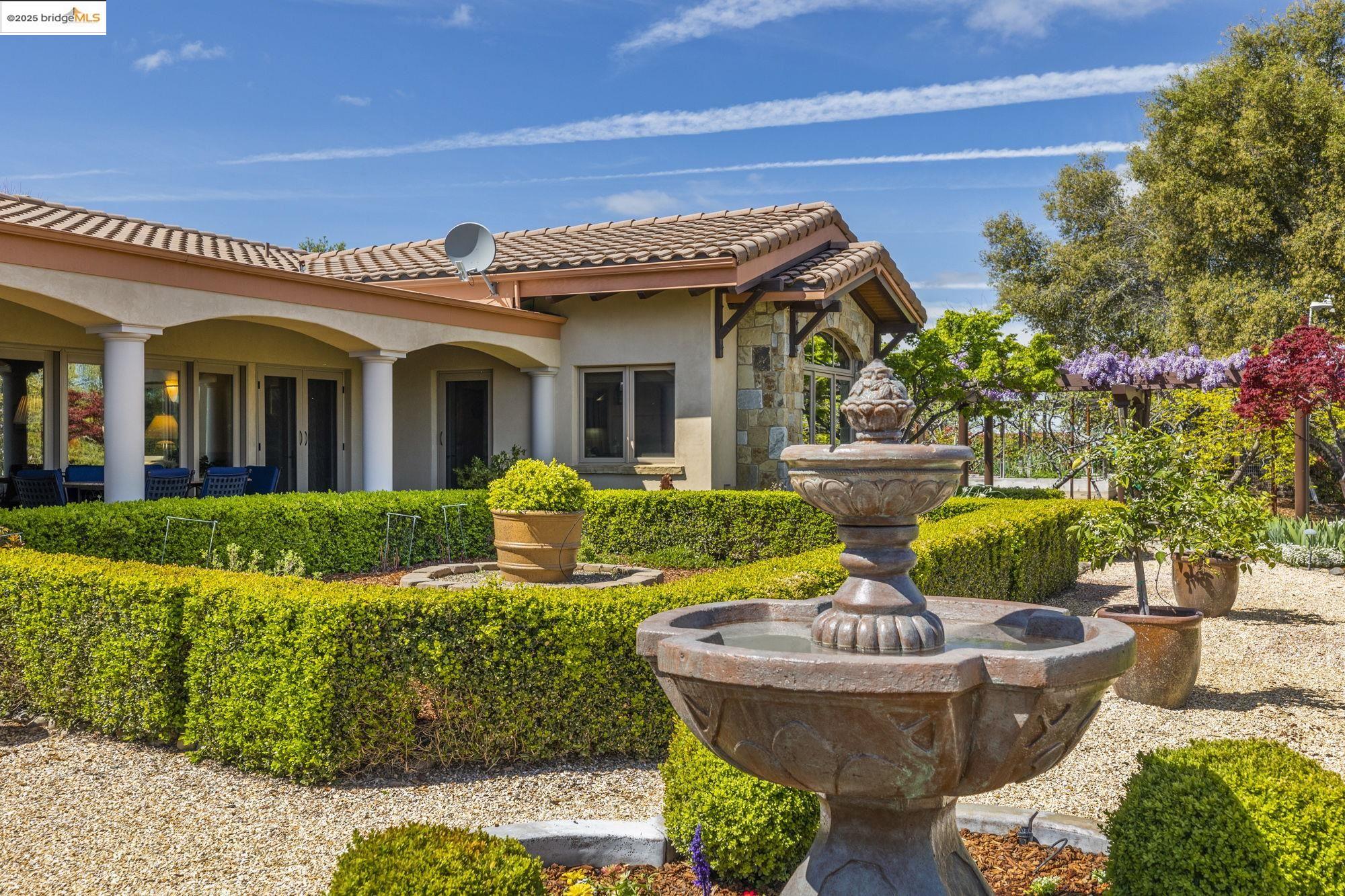 10270 Slate Rim Road Sonora, CA 95370 - Photo 47 of 55 a front view of house with outdoor seating