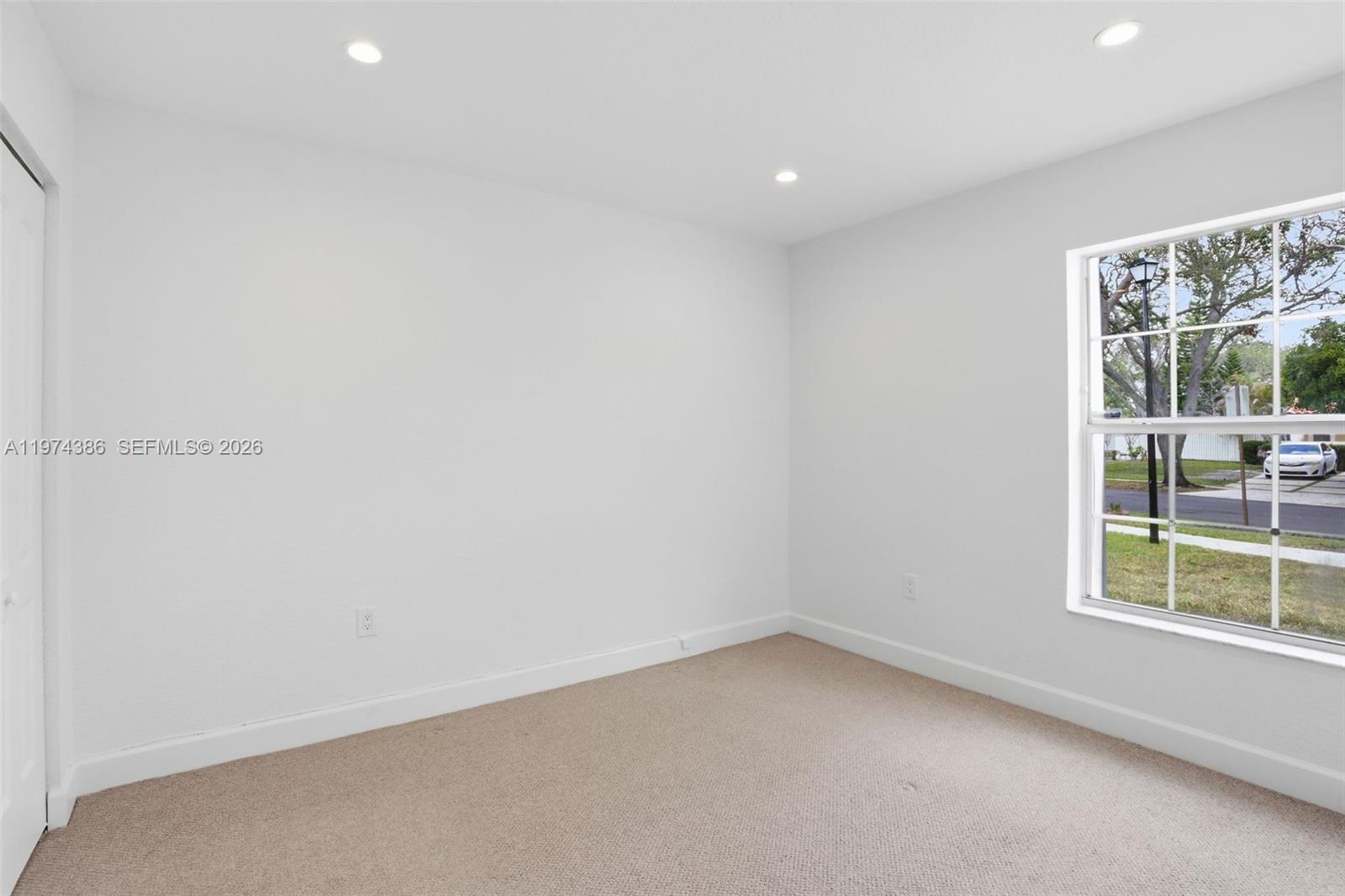 12930 Southwest 20th Street Miramar, FL 33027 - Photo 26 of 48 an empty room with a window