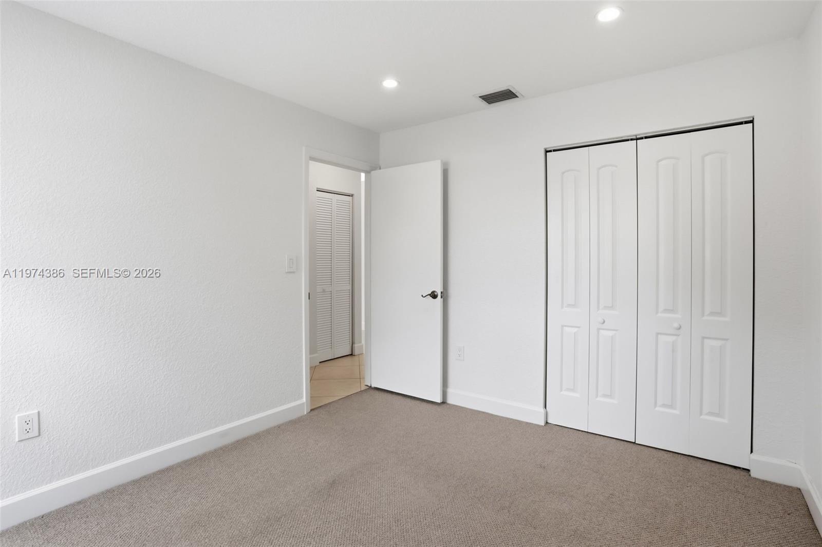 12930 Southwest 20th Street Miramar, FL 33027 - Photo 27 of 48 a view of an empty room