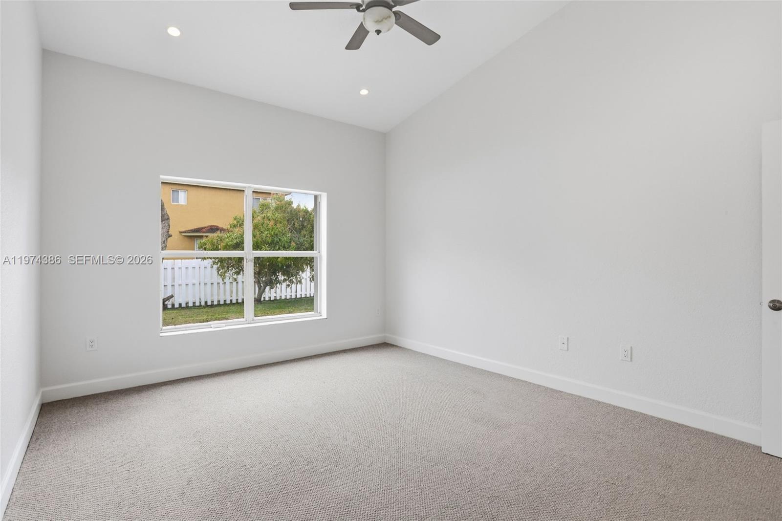 12930 Southwest 20th Street Miramar, FL 33027 - Photo 30 of 48 an empty room with a window