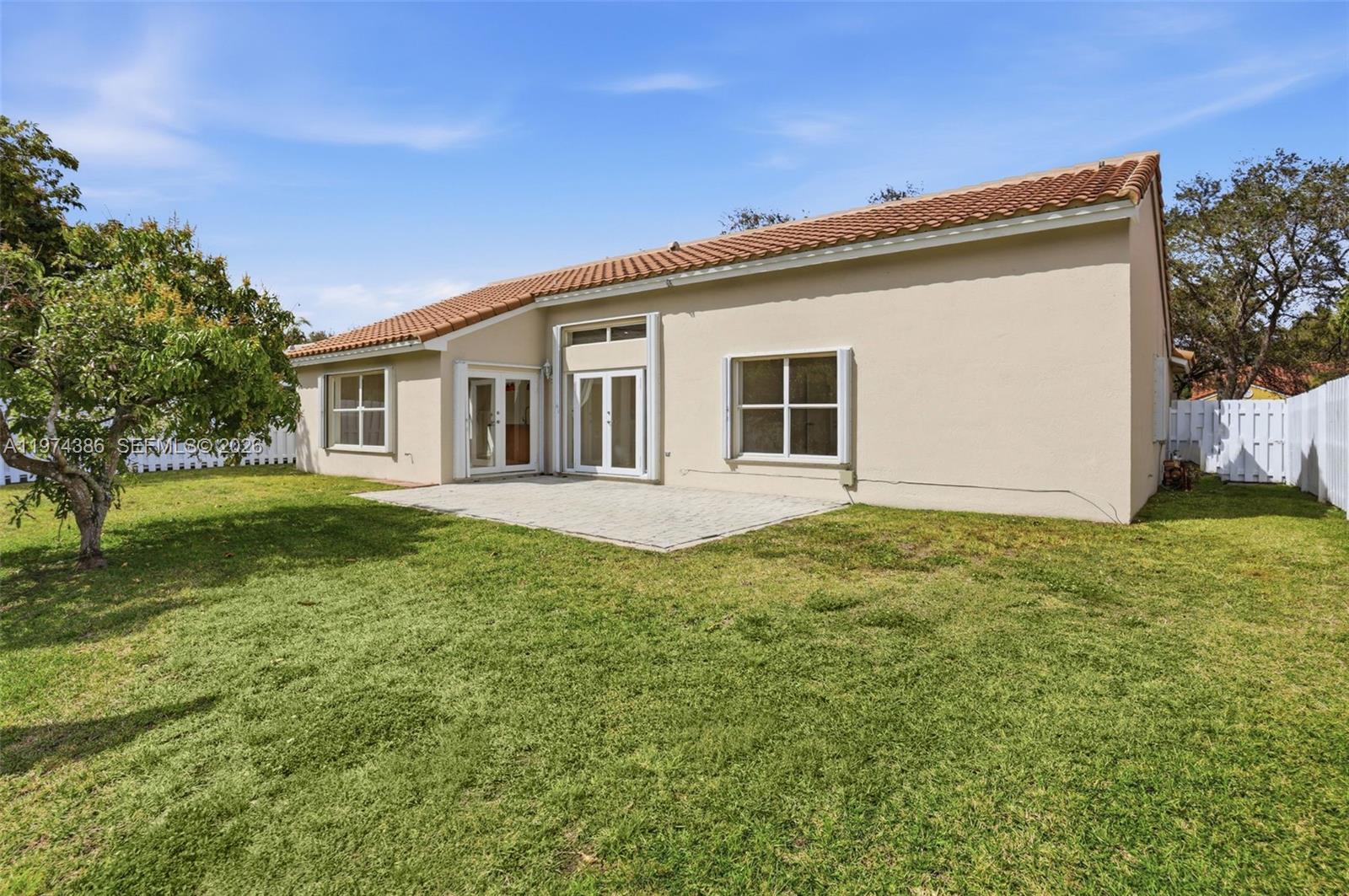 12930 Southwest 20th Street Miramar, FL 33027 - Photo 39 of 48 a house view with a garden space