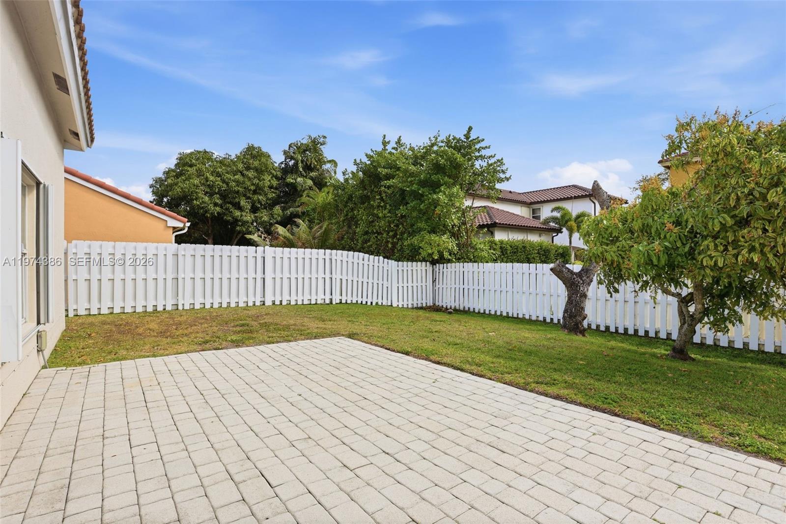 12930 Southwest 20th Street Miramar, FL 33027 - Photo 42 of 48 a view of backyard and trees