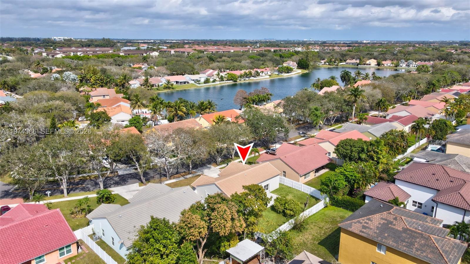 12930 Southwest 20th Street Miramar, FL 33027 - Photo 45 of 48 an aerial view of residential houses with outdoor space and lake view