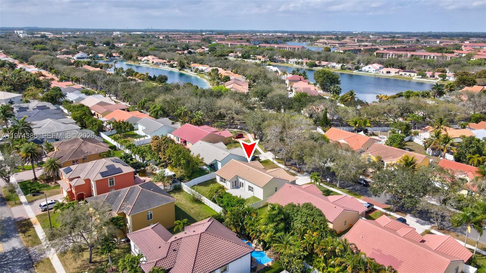 12930 Southwest 20th Street Miramar, FL 33027 - Photo 46 of 48 an aerial view of residential houses with outdoor space