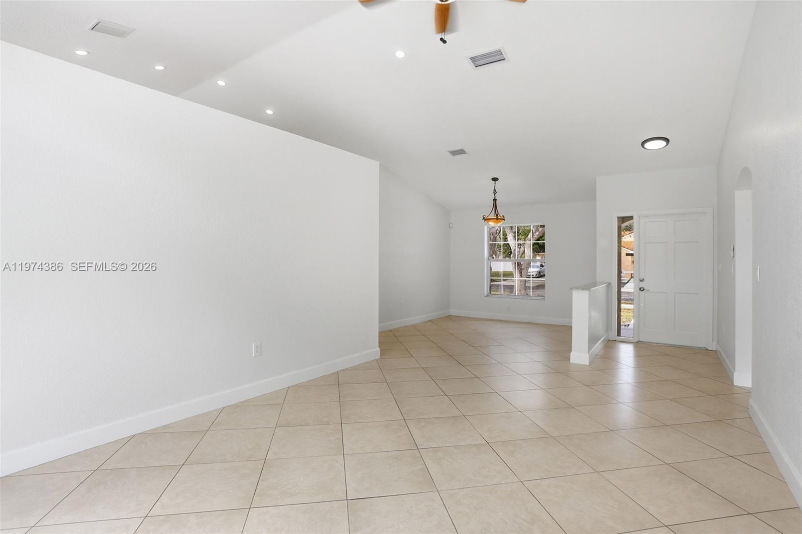 12930 Southwest 20th Street Miramar, FL 33027 - Photo 8 of 48 a view of an empty room