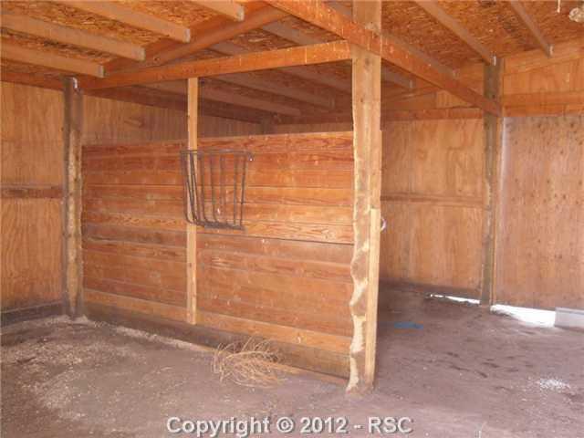 17545 Sage Crest Road Peyton, CO 80831 - Photo 10 of 14 stalls in barn