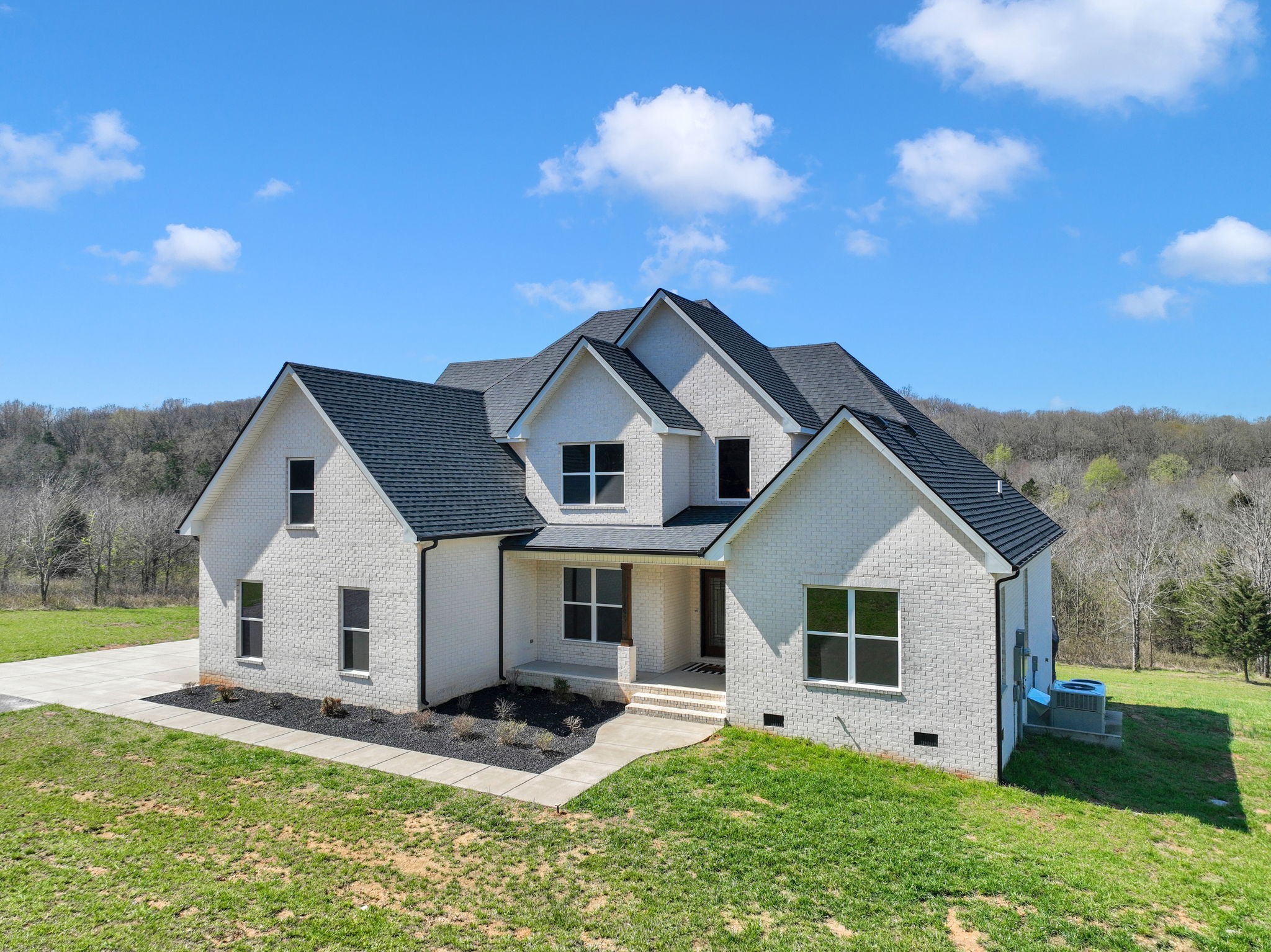 200 Charles Smith Road Lascassas, TN 37085 - Photo 2 of 62 a view of a yard in front of house with a yard