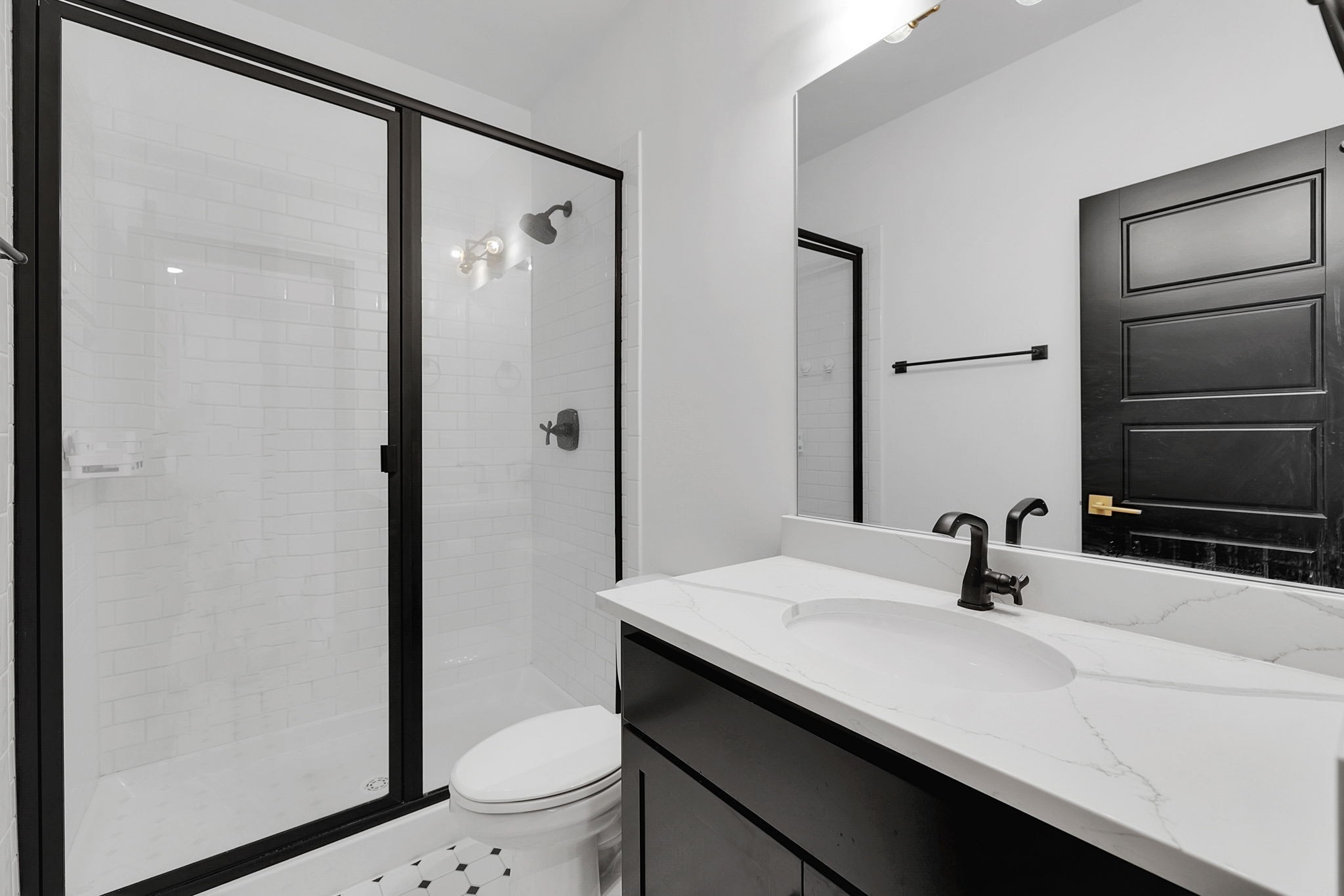 200 Charles Smith Road Lascassas, TN 37085 - Photo 40 of 62 a bathroom with a sink a toilet a shower and a mirror