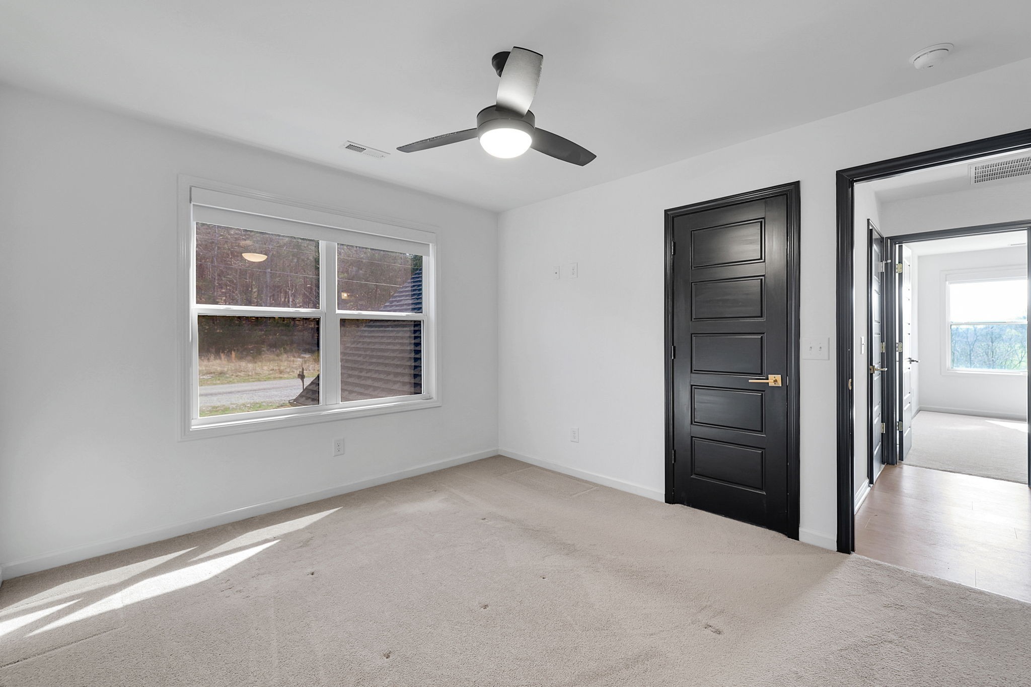 200 Charles Smith Road Lascassas, TN 37085 - Photo 45 of 62 an empty room with windows and cabinet
