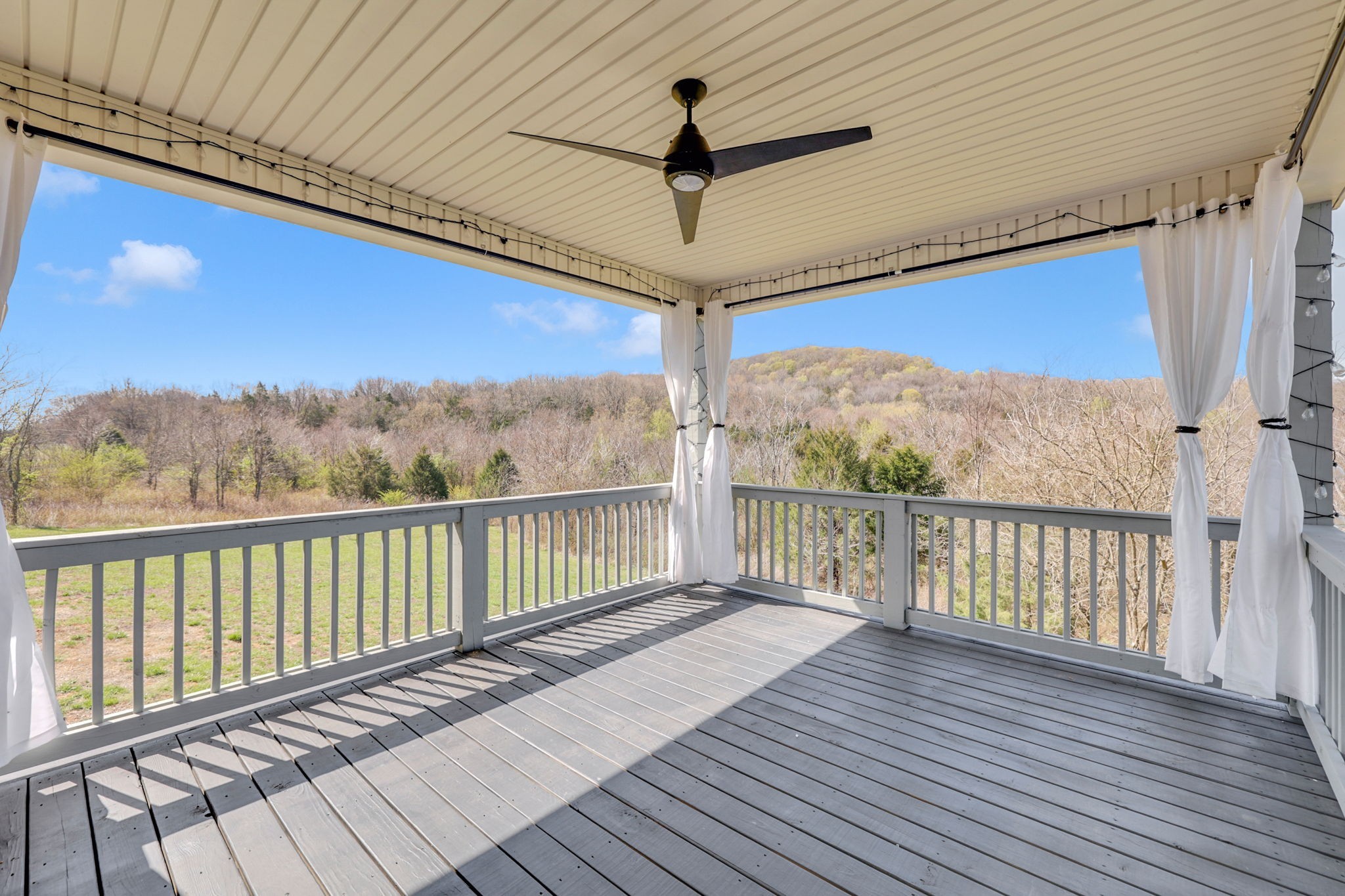 200 Charles Smith Road Lascassas, TN 37085 - Photo 48 of 62 a view of a balcony with wooden floor