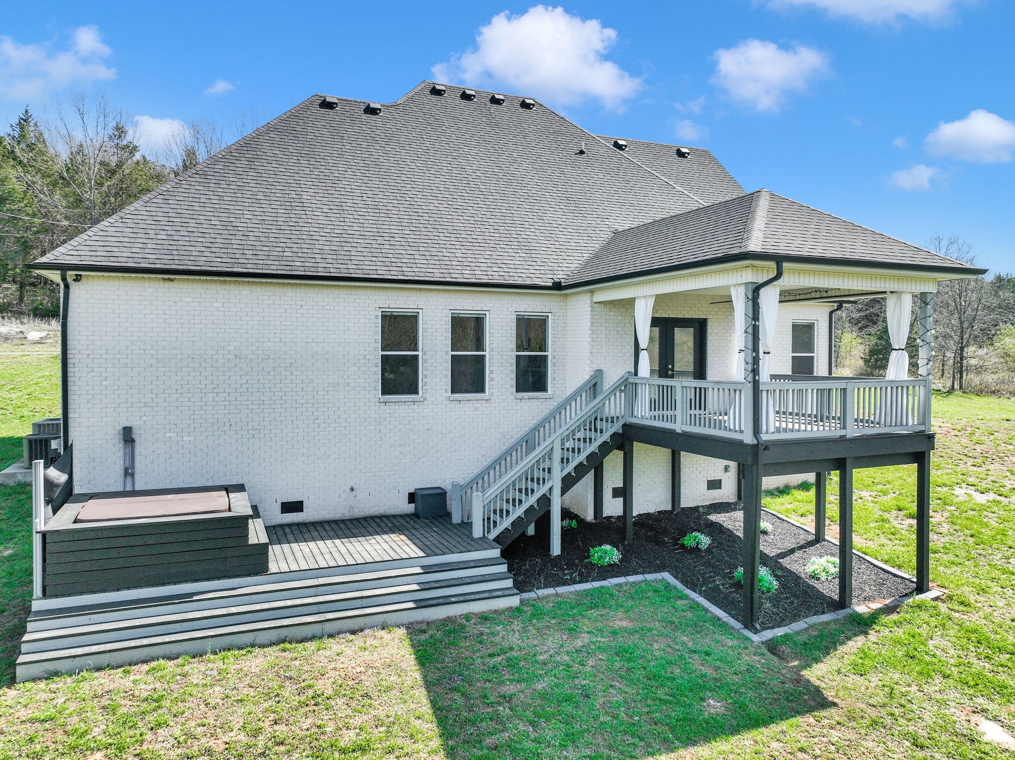 200 Charles Smith Road Lascassas, TN 37085 - Photo 51 of 62 a front view of a house with a yard