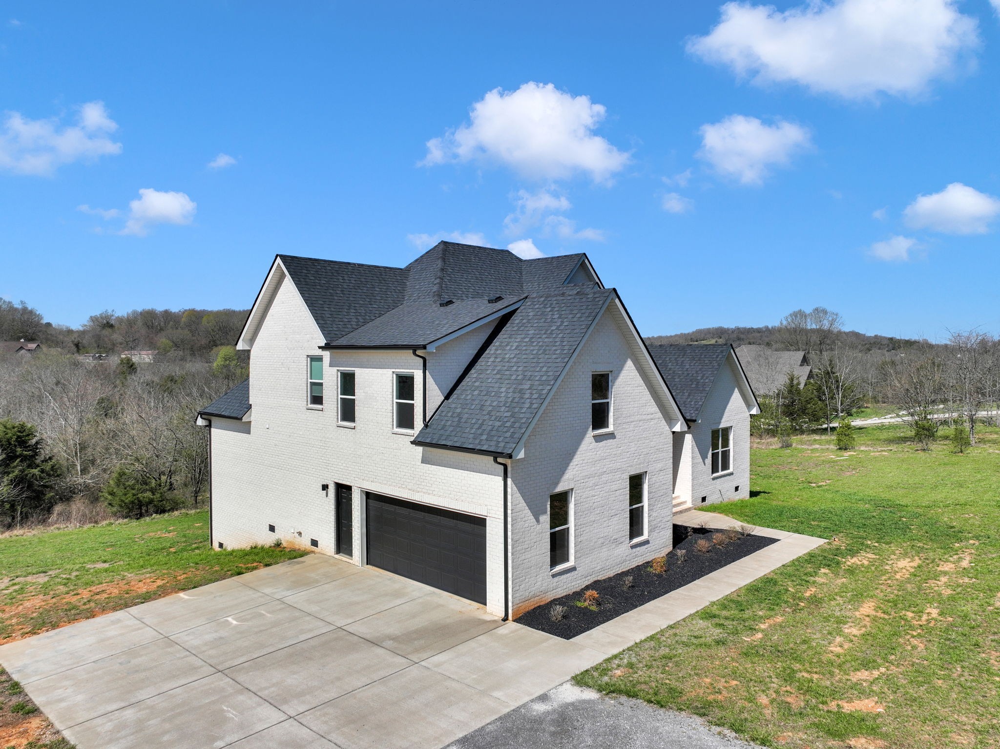 200 Charles Smith Road Lascassas, TN 37085 - Photo 54 of 62 a view of a house with a yard