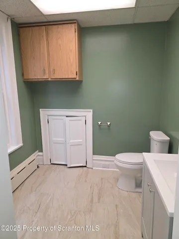 a bathroom with a sink and mirror