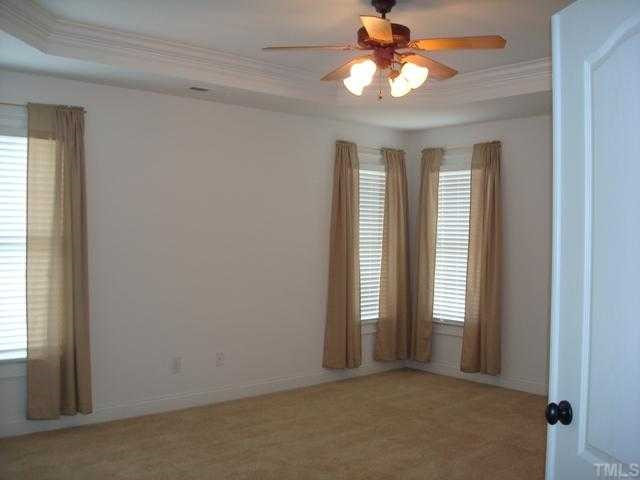 154 Fort Jackson Road Morrisville, NC 27560 - Photo 7 of 12 MASTER SUITE WITH DOUBLE DOORS AND TREY CEILING