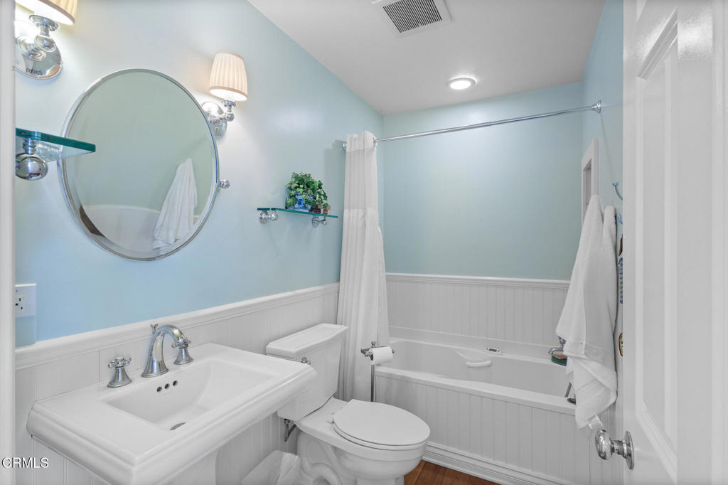 4505 Gateshead Bay Oxnard, CA 93035 - Photo 17 of 41 a bathroom with a sink a toilet and a mirror