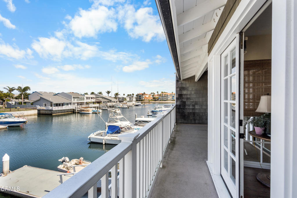 4505 Gateshead Bay Oxnard, CA 93035 - Photo 23 of 41 a view of a balcony next to a lake view