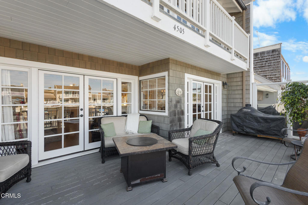 4505 Gateshead Bay Oxnard, CA 93035 - Photo 32 of 41 a balcony with furniture and a potted plant