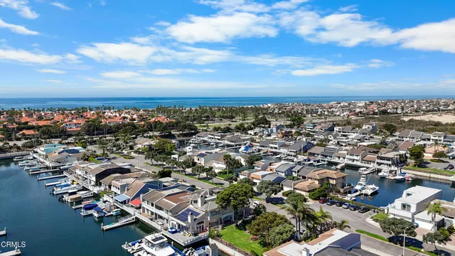 an aerial view of a city with lots of residential buildings
