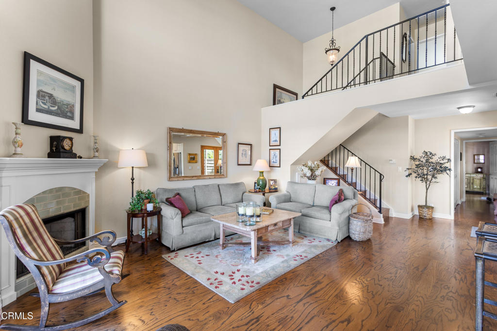 4505 Gateshead Bay Oxnard, CA 93035 - Photo 6 of 41 a living room with furniture and a fireplace