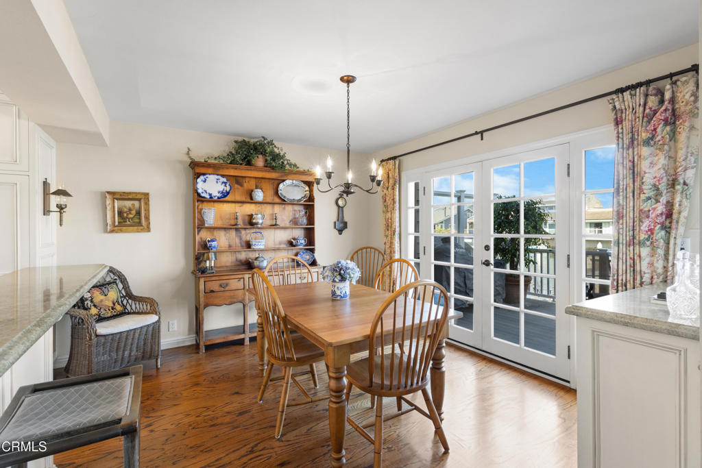 4505 Gateshead Bay Oxnard, CA 93035 - Photo 9 of 41 a view of a dining room with furniture window and wooden floor