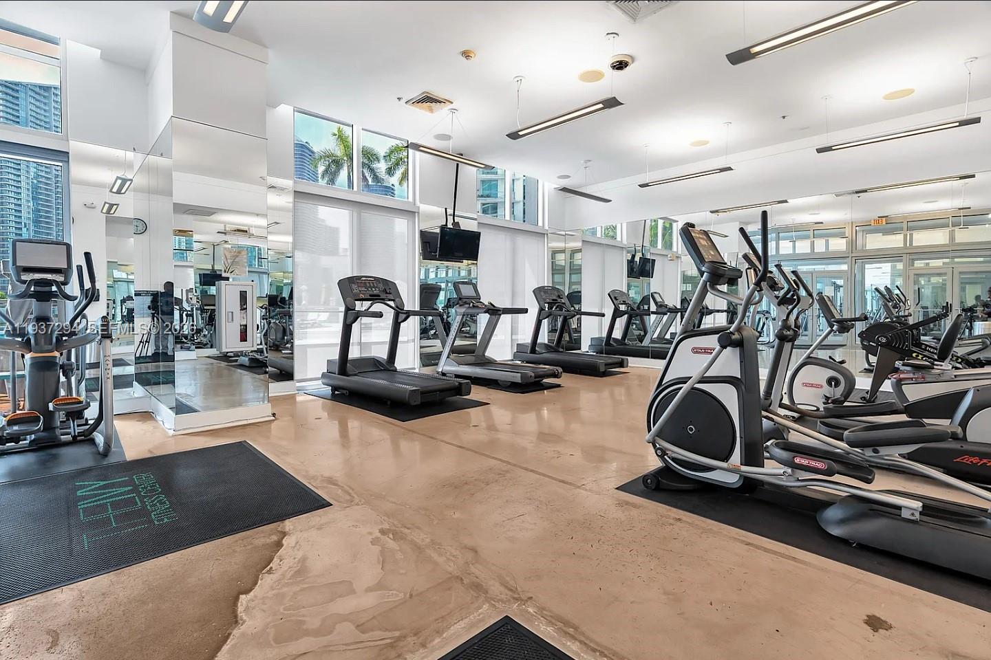 90 Southwest 3rd Street, Unit 2703 Miami, FL 33130 - Photo 21 of 28 a view of a room with gym equipment
