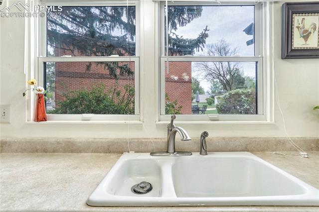 2455 Paseo Road Colorado Springs, CO 80907 - Photo 11 of 32 Kitchen window overlooks the patio and green space.