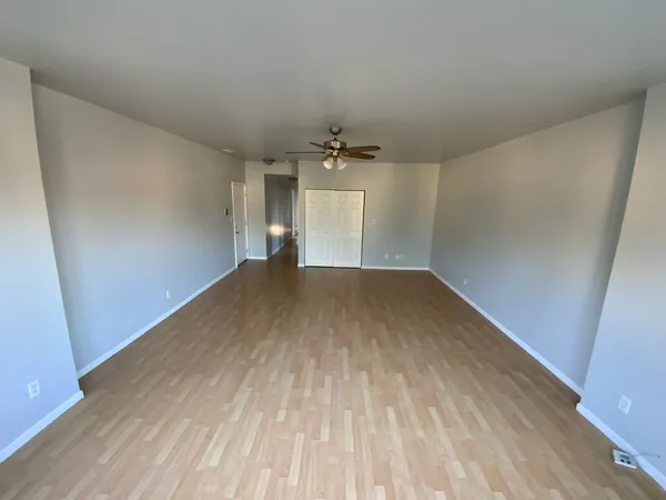 wooden floor in a hall with an entryway